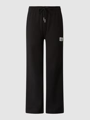 Spodnie dresowe z detalem z logo  od Calvin Klein Jeans Czarny - 27