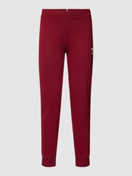 Spodnie dresowe z wyhaftowanym logo od Tommy Hilfiger Bordowy - 19