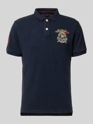 Koszulka polo w kroju regular fit z naszywkami z logo od Superdry - 28