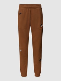 Sweatpants met labelstitching van Nike Bruin - 48