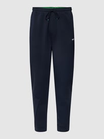 Trackpants mit Label-Applikation Modell 'HADIKO' von BOSS Green Blau / Türkis - 19