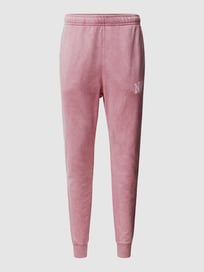 Sweatbroek met labelprint van Nike Roze - 43